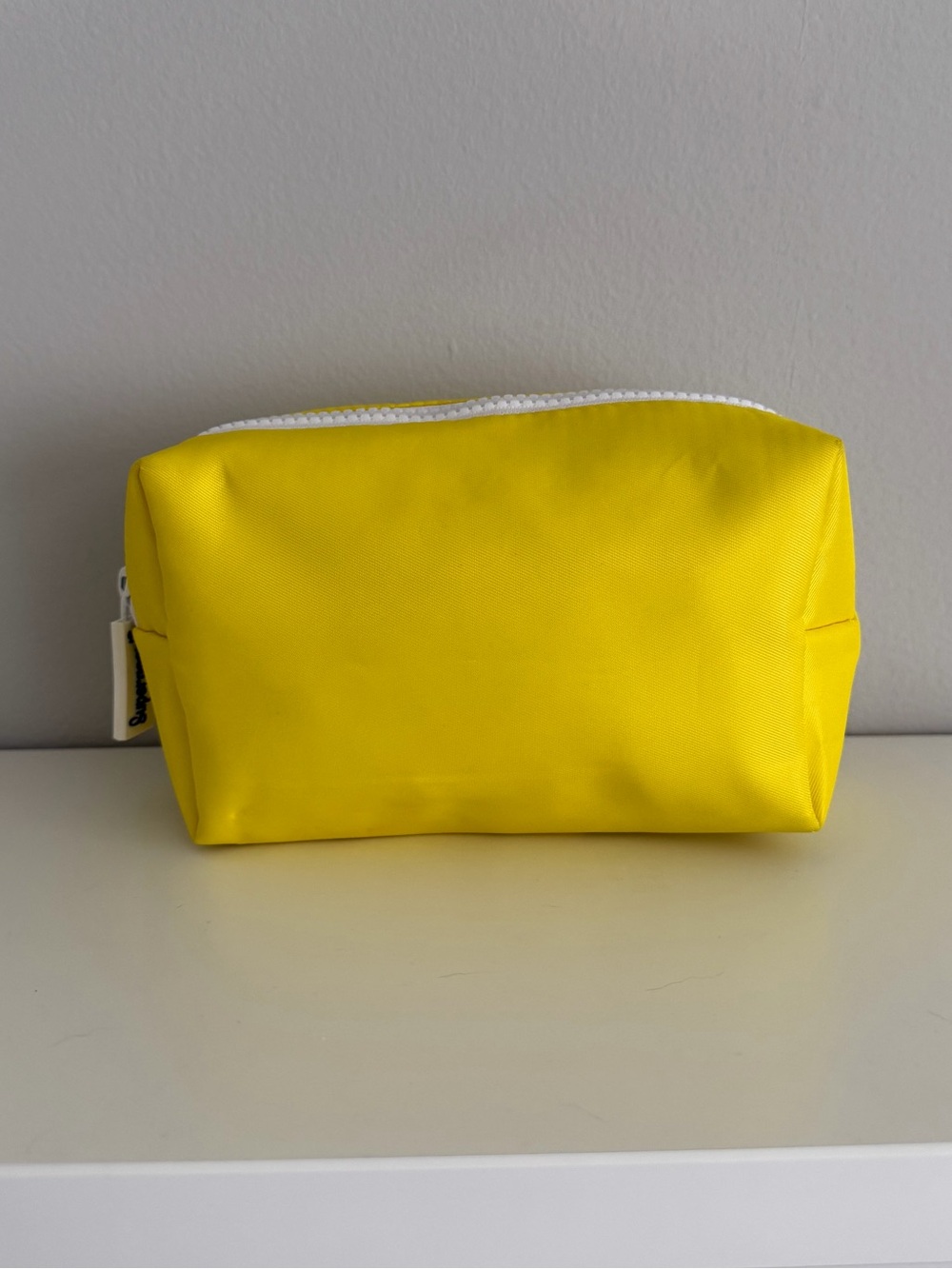 Supergoop Bright Yellow Zipper Pouch